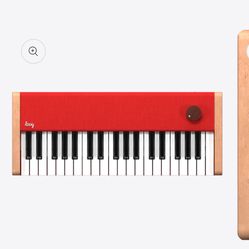 LOOG RED PIANO BRAND NEW IN BOX !