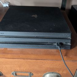 PS4 Pro And 3 Controllers