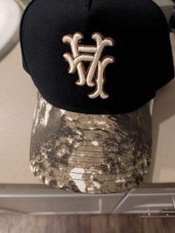La camo snapback hat