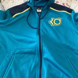 Zip up jacket with hoodie and pockets. Men’s large.