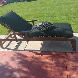 Wooden Lounge Chair With Cushion.