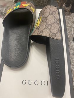 Gucci tiger slides deals real vs fake