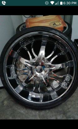 22" rims w/ tires. Fairly brand new, however not much wear & tear.