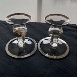 Two candleholders