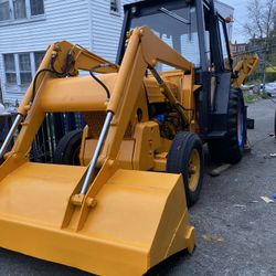 Ford 545 Backhoe With Loader 