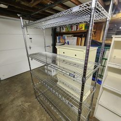 Heavy Duty Shelving unit
48"w x 18"d x 72"h
Has 5 shelves, holds 800 pounds per shelf!