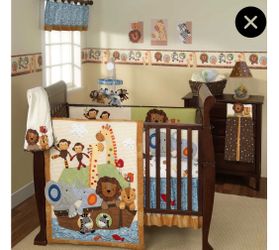 Noah's Ark and animal designs make this Lambs & Ivy crib set