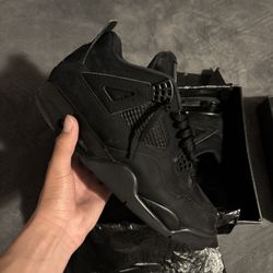 Black Cat Jordan 4s