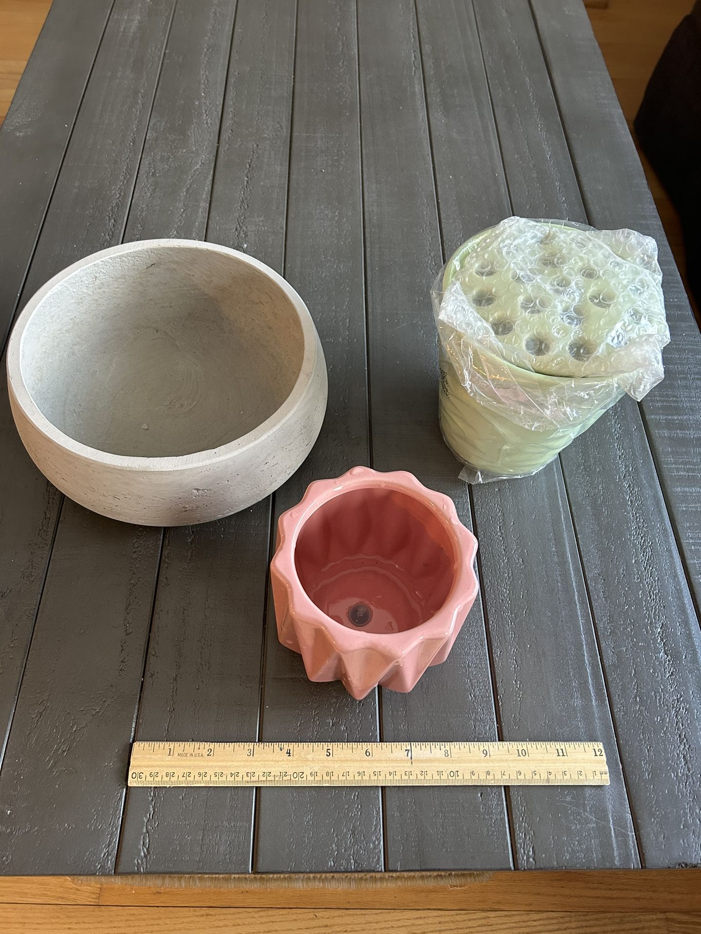 One shallow planter, one flower arranging vase (brand new), and one planter pot
