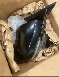 Genuine GM Passenger Side door mirror w/housing