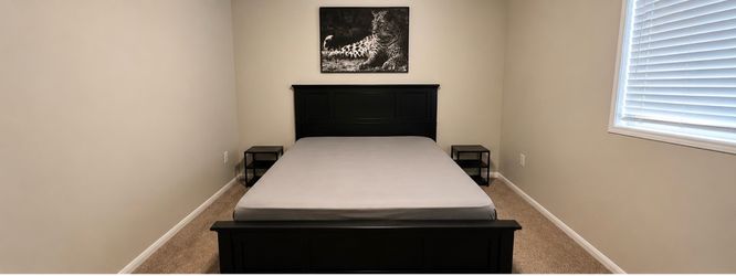 Bed frame with mattress and box springs included