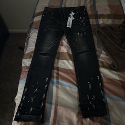 Purple Jeans Color: Black  Size 33