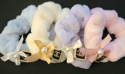 fuzzy or plush hair scrunchies with bow accent 