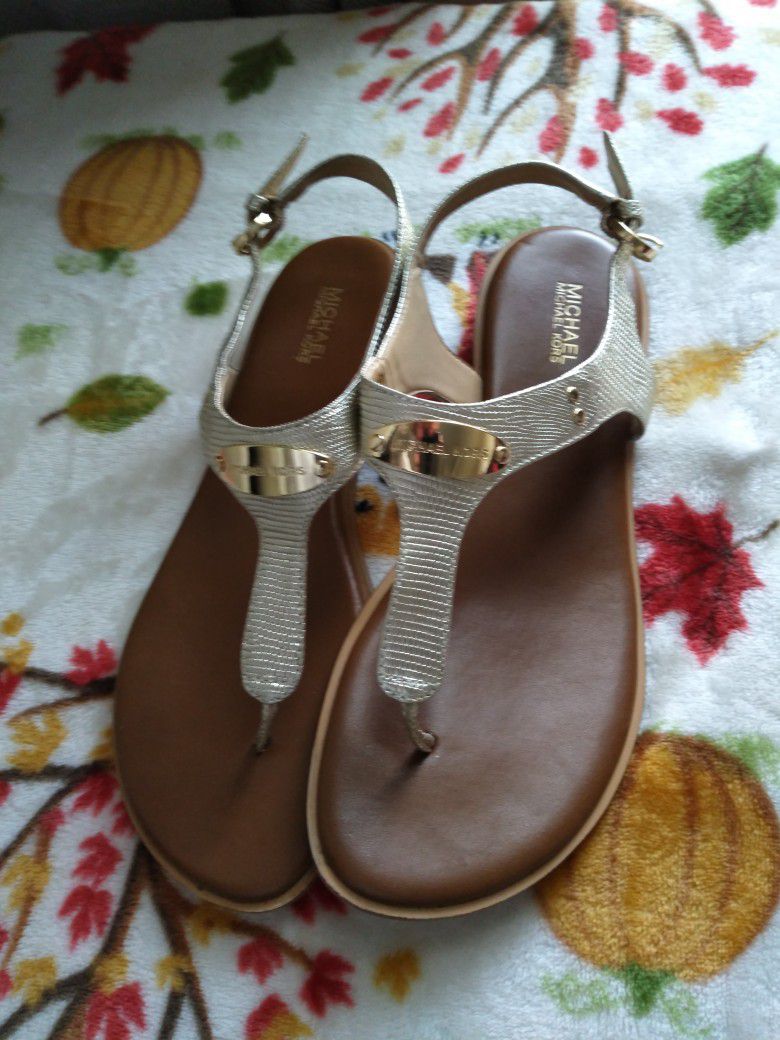 Michael Kors Sandals. Purchased from Macy's for$125.00.  Only worn once.$35.00