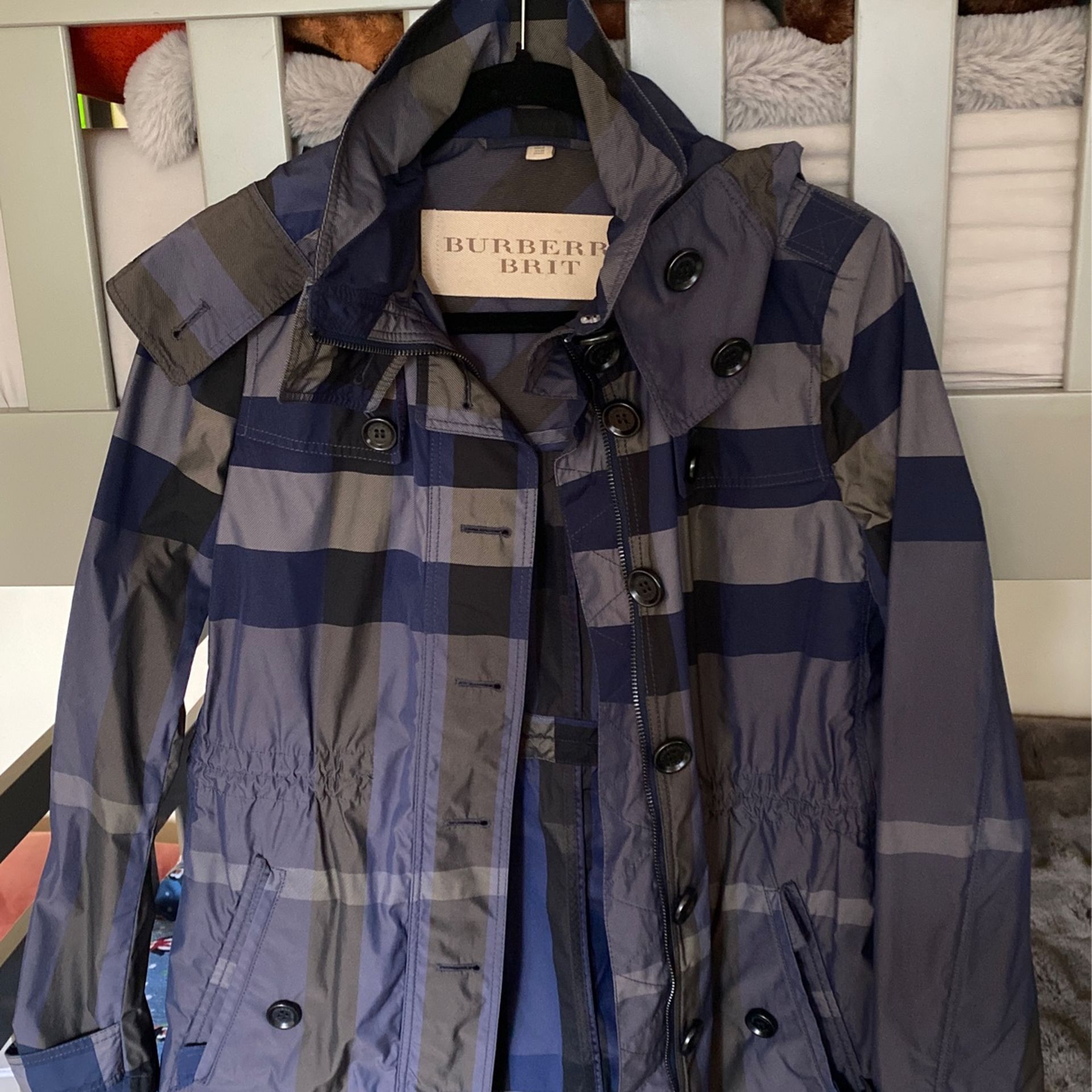 Woman’s Burberry Raincoat Size 4