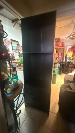 Beautiful black shelf  2 drawers .$35