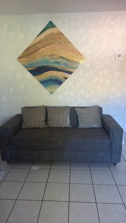 Navy blue sofa with pillows,TV stand, curtainsu