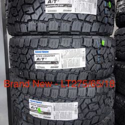 (4) - LT275/65/18 Toyo Open Country A/T III Tires