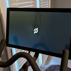 Peleton bike as new + 2 pair of shoes + heart rate monitor (can deliver for small fee)