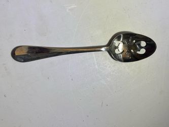 International stainless steel slotted serving spoon