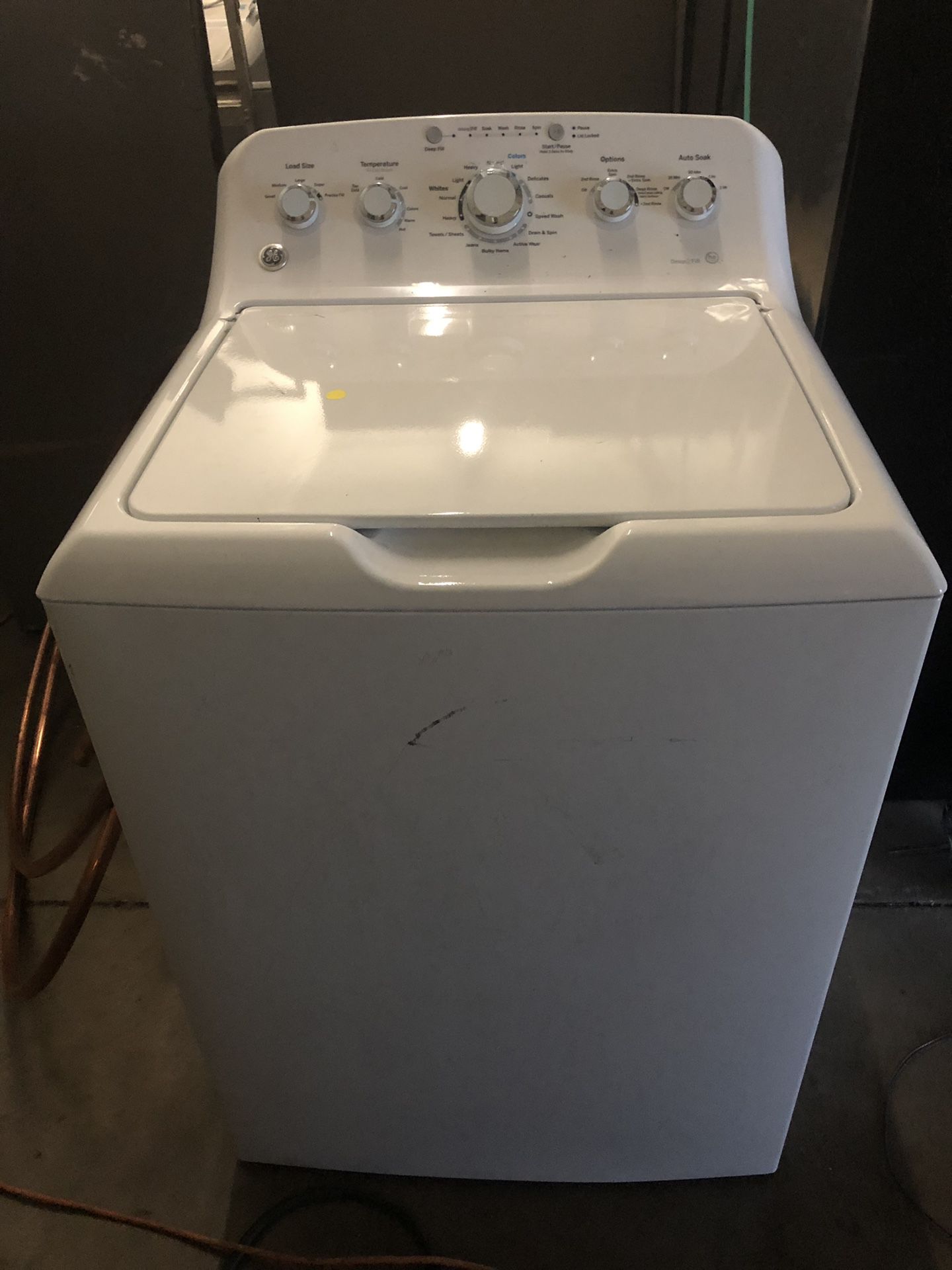 Brand New GE. Top load washer