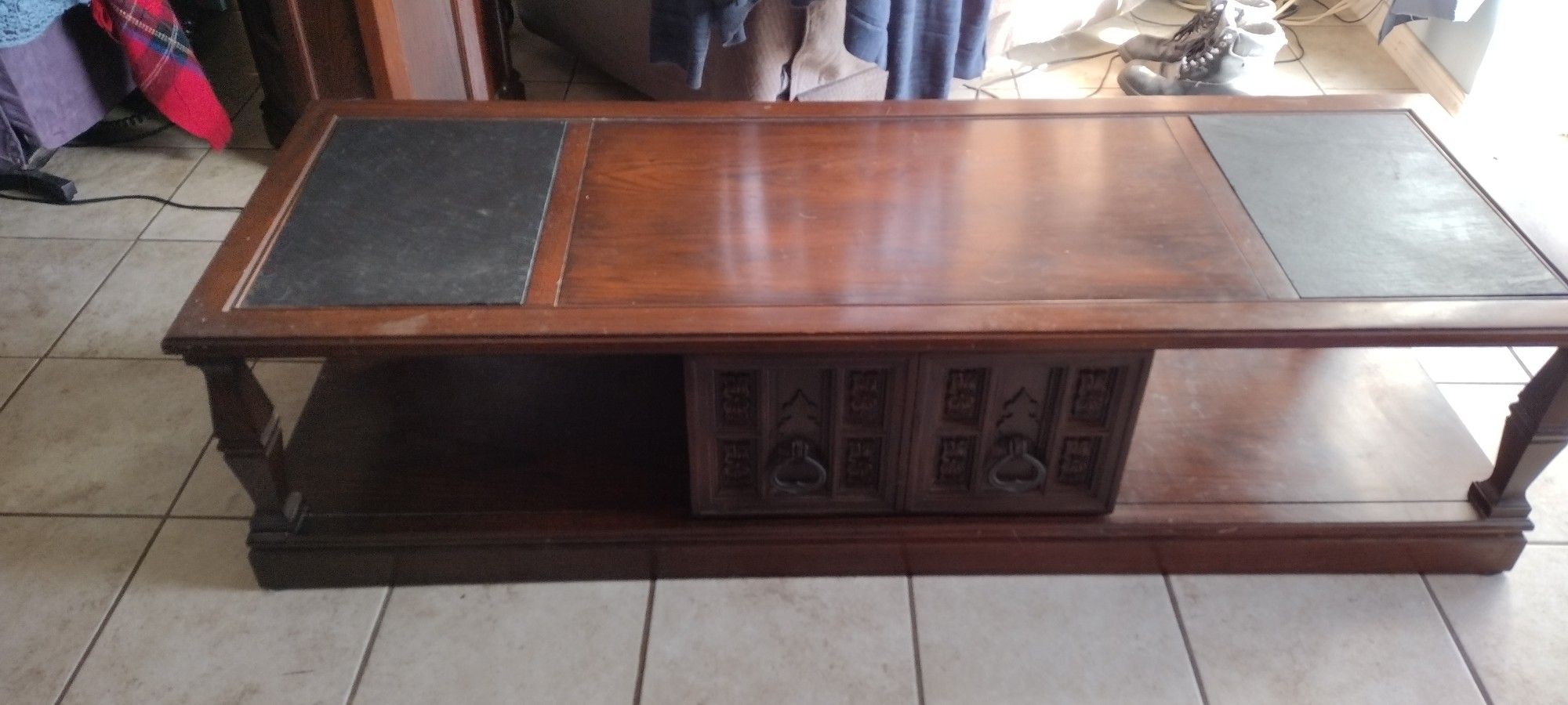 Great Condition Coffee Table With Sliding Door