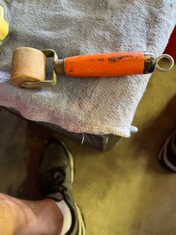 Wallpaper seam roller.