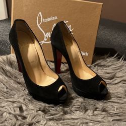 CHRISTIAN LOUBOUTIN