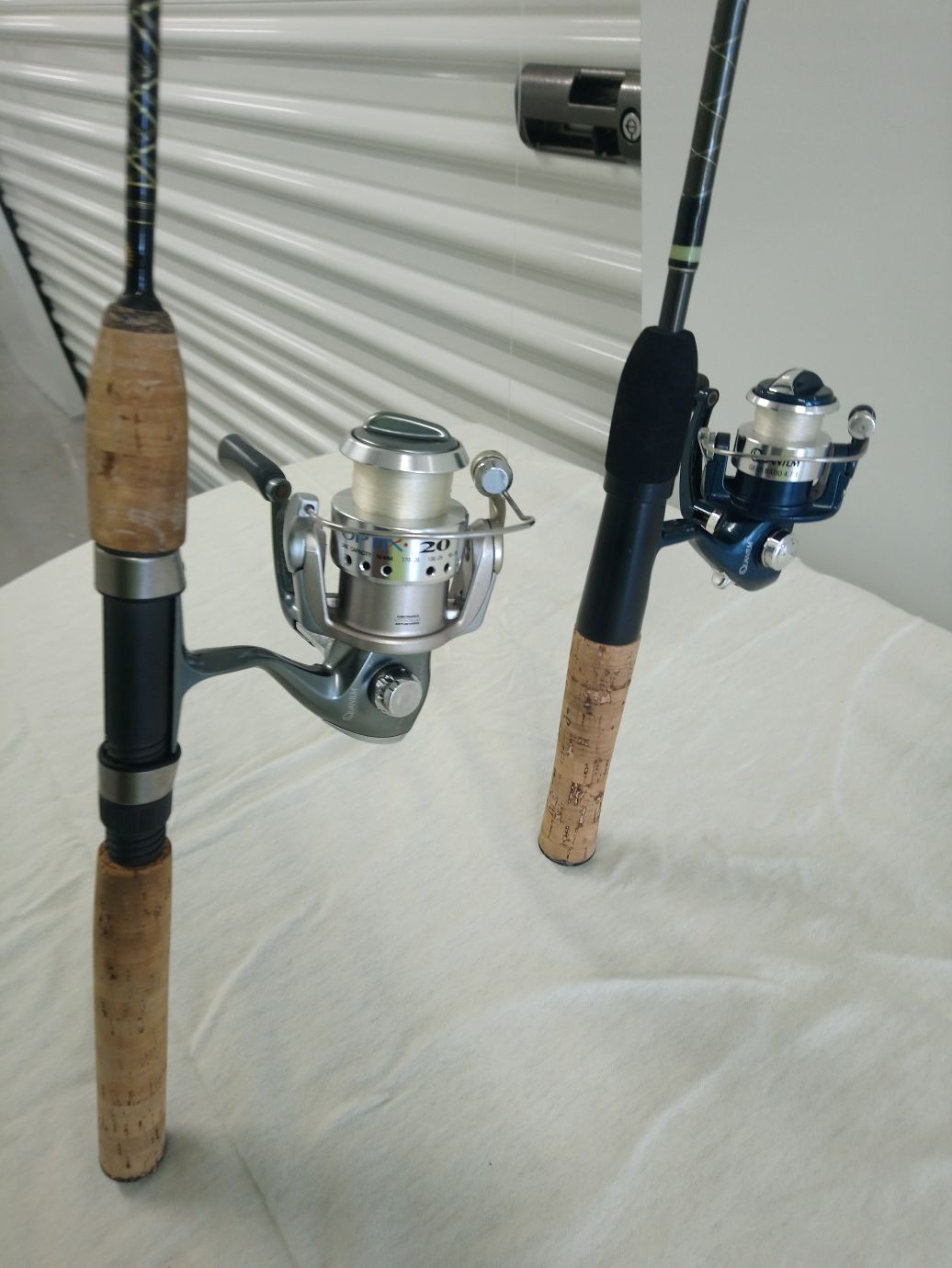2 Quantum fishing reels and rods.