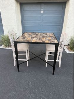 Table W/2 Chairs