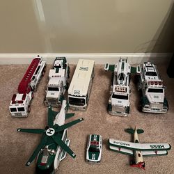Lot Of  12 Hess Trucks And Planes 