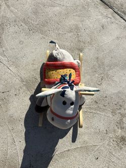 B. toys Rodeo Rocker Spotty / Rocker Horse 