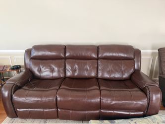 Brown Leather Sofa with power recliners