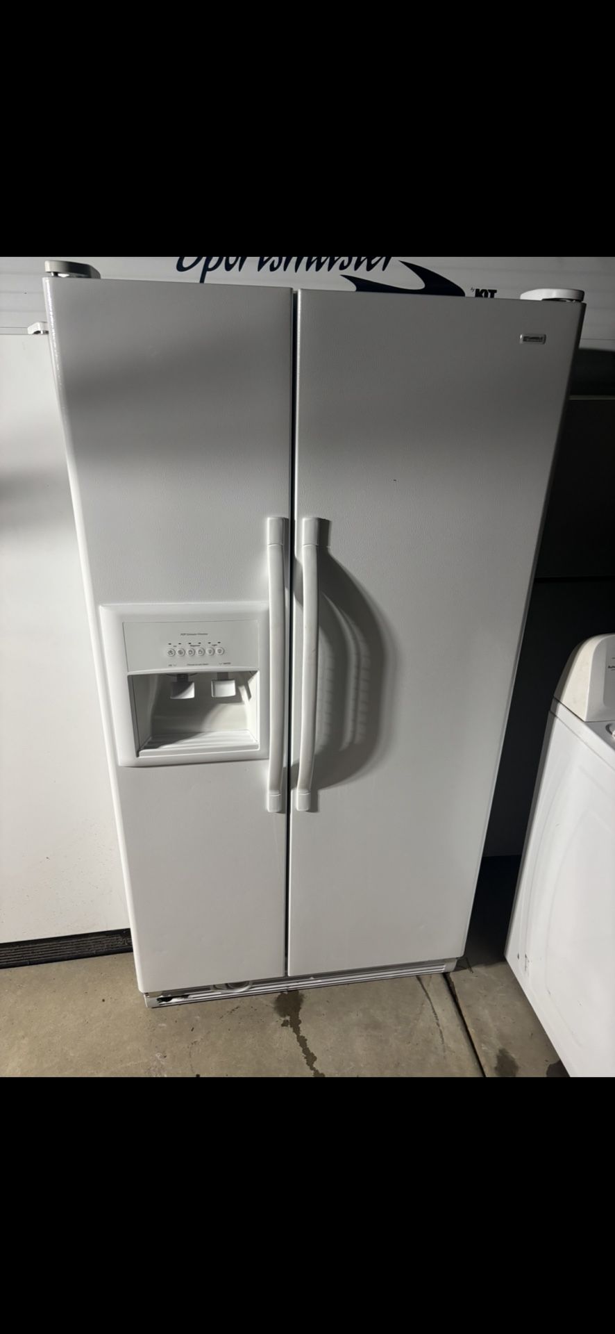 Very clean white side-by-side refrigerator will deliver and install