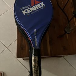 Kennel Cover And Tennis Racket