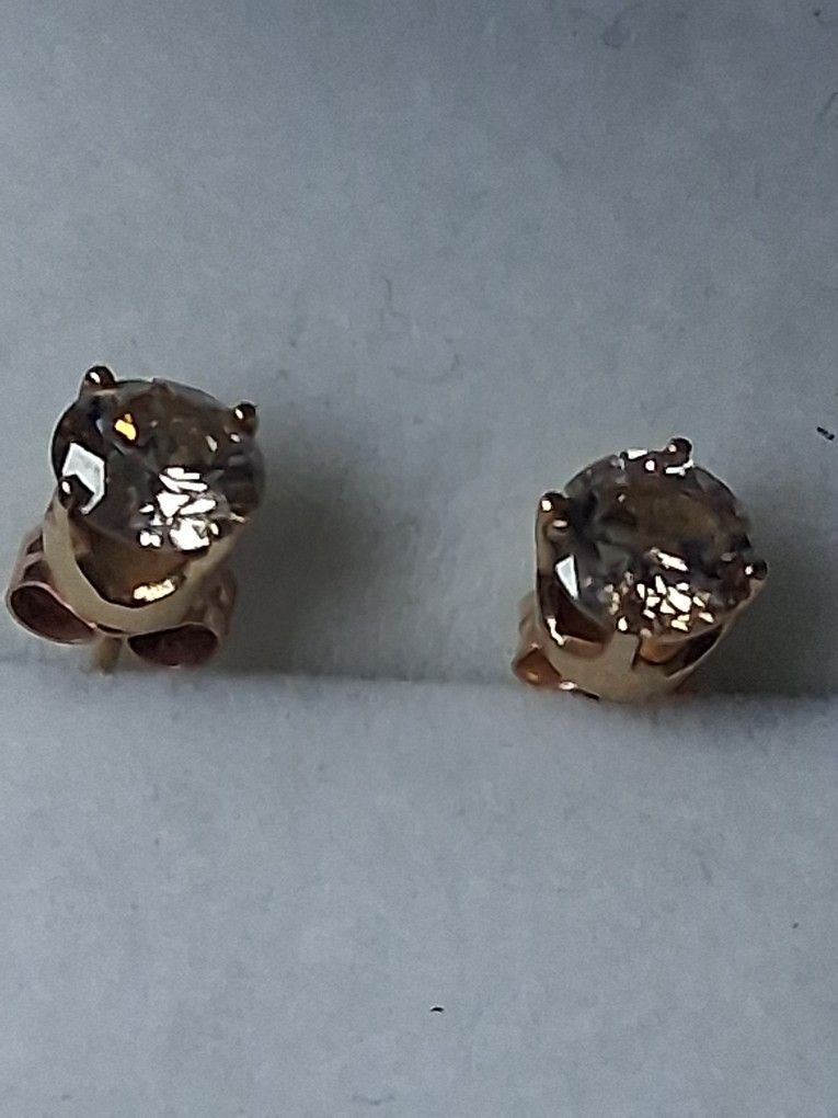1 CT. Yellow Diamond Earings Paid 4000.00
