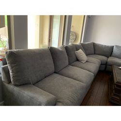 Living spaces grey sectional