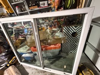 Brand New- Never installed- Hurricane custom-sized insulated glass unit (IGU) measuring 46 inches wide by 27 13/16 inches high. It features clear glas