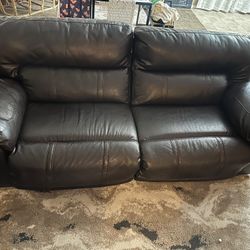 set of 2 brown couches that recline 