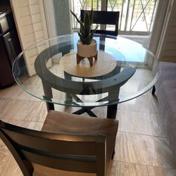 Glass kitchen table with two chairs, 