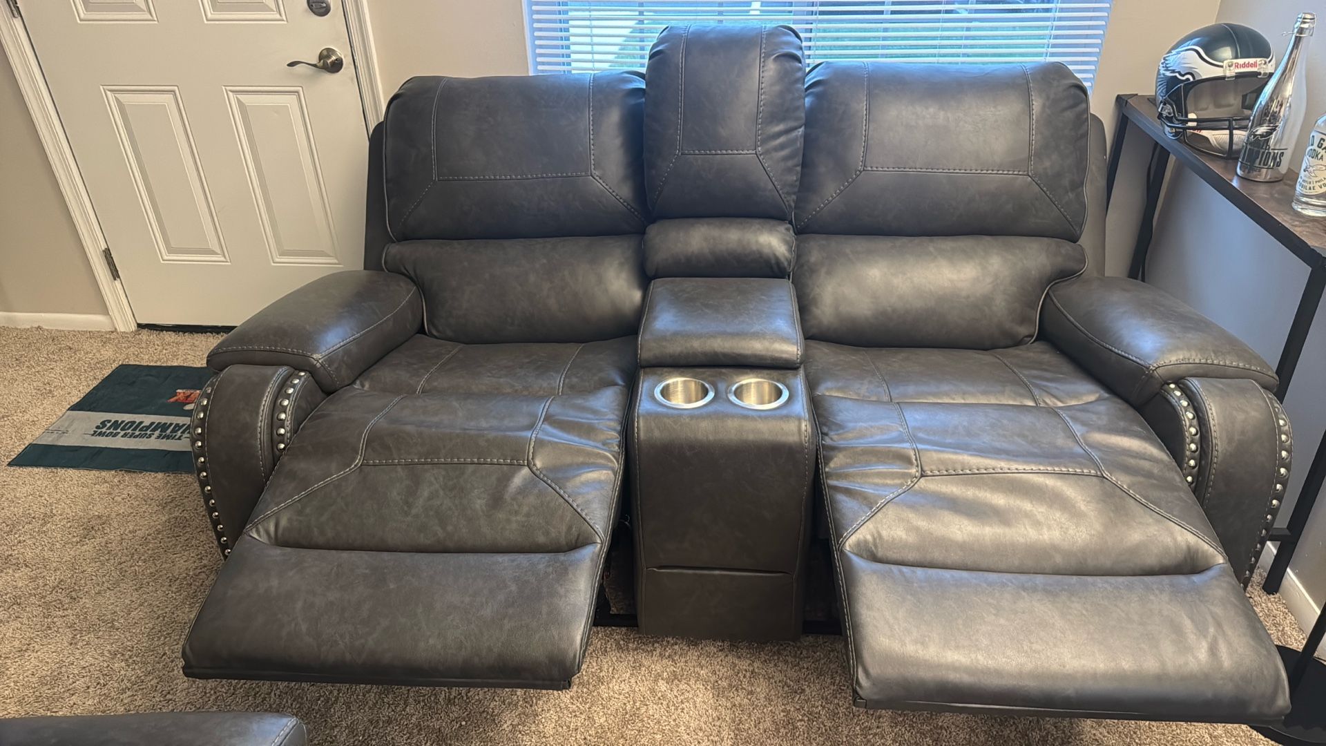 Brand New, Never Sat On. Raymour Flanigan Love Seat Leather, Gliding Recliner.