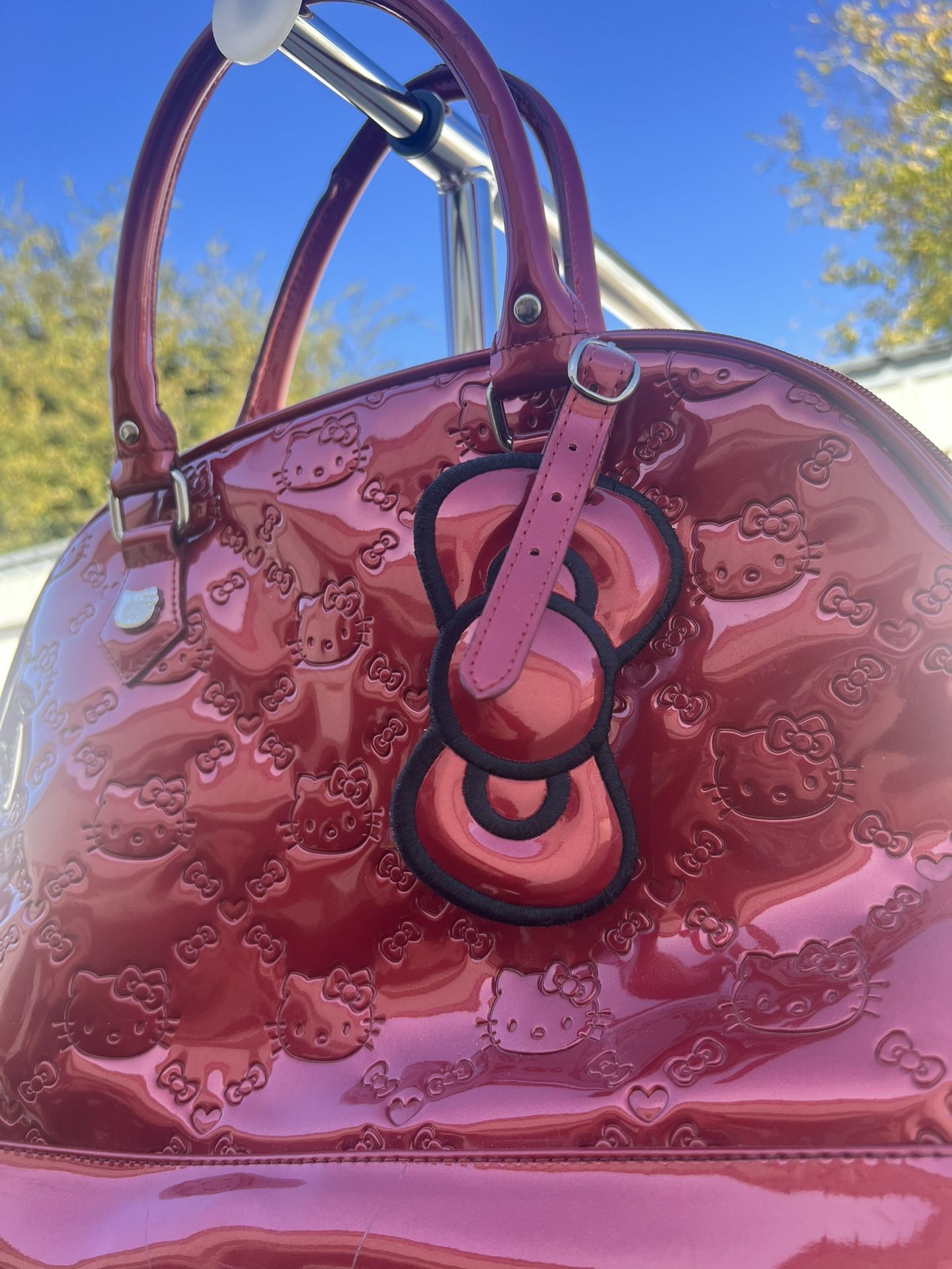 Lounge fly hello kitty purse