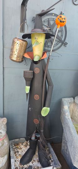 Metal witch garden decor