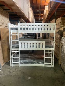 Triple bunk bed. Available in white & espresso. Assembly required. Assembly not included. Taxes included. Free delivery.  Bunk bed only-$450 Bunk bed 