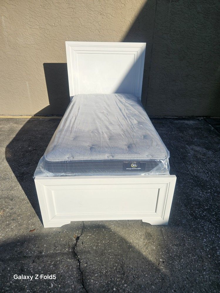 White Twin Size Solid Wood Bed Frame With Brand New Twin Size Plush Serta Mattress And Box Spring In Plastic 
