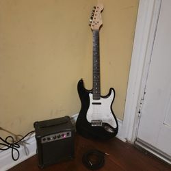 Fender Squier Stratocaster Pro RockBand MIDI Guitar Matte Black & Keith Urban 10 Watt Amp With Guita