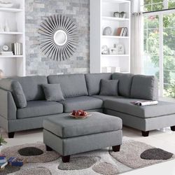 Brand New 104" x 75" Gray Reversible Sectional + Ottoman