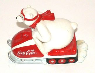 Two Porcelain Polar Bear Coca Cola Items One Polar Bear On Snowmobile And One Polar Bear Cubs Both Like New Located In Palm Springs CA 