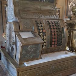 Own a piece of history with this Amazing Antique National Cash Register.18″x 15″x 22-1/2″ bought in Taos