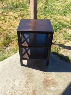 Dark brown end table storage shelf